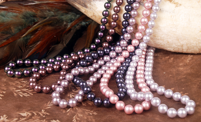Swarovski pearls in purple and pink colors